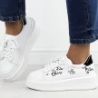 Białe skórzane sneakersy damskie na platformie Filippo Dp6300/24