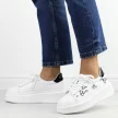 Białe skórzane sneakersy damskie na platformie Filippo Dp6300/24