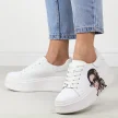 Białe skórzane sneakersy damskie na platformie Filippo Dp6207/24