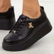 Czarne skórzane sneakersy damskie na platformie Filippo Dp6246/25