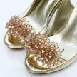 Złote przeźroczyste sandały damskie na szpilce z ozdobą, transparentne SABATINA 1101-150