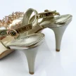 Złote przeźroczyste sandały damskie na szpilce z ozdobą, transparentne SABATINA 1101-150