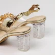 Złote silikonowe sandały damskie na słupku z kryształami, transparentne DiA MR-D1