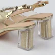 Złote silikonowe sandały damskie na słupku z kryształami, transparentne DiA 1037-43